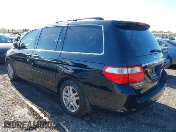 2006 Honda Odyssey Touring with VIN 5FNRL38896B018131, listed as a IAAI auction lot 43301389 with 312,984 mi miles and . Bid and sale history available at DreamBid. Image 3.