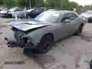 2018 Dodge Challenger T/A with VIN 2C3CDZBTXJH311594, listed as a IAAI auction lot 43202742 with 76,854 mi miles and . Bid and sale history available at DreamBid. Image 2.