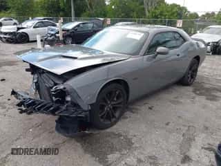 2018 Dodge Challenger T/A with VIN 2C3CDZBTXJH311594, listed as a IAAI auction lot 43202742 with 76,854 mi miles and . Bid and sale history available at DreamBid. Image 2.