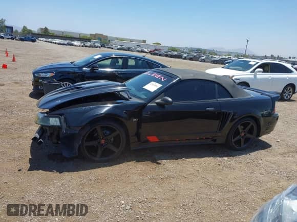 2002 Ford Mustang GT Deluxe z VIN 1FAFP45X92F229236, wystawiony jako IAAI lot #42565552 z przebiegiem 122 504 mil mil oraz . Historia ofert i sprzedaży dostępna na DreamBid. Obrazek 15.