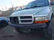 2002 Dodge Dakota Sport with VIN 1B7HG38N12S661043, listed as a IAAI auction lot 41552725 with 206,662 mi miles and . Bid and sale history available at DreamBid. Image 6.