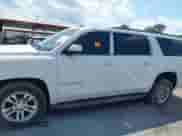 2015 Chevrolet Suburban с VIN 1GNSC5EC2FR525573, выставлен на аукционе IAAI как лот 40407018 с пробегом 209 157 миль миль и . История ставок и продаж доступна на DreamBid. Изображение 14.