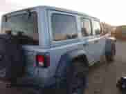 2023 Jeep Wrangler with VIN 1C4JJXN65PW612855, listed as a IAAI auction lot 41285856 with 11,868 mi miles and . Bid and sale history available at DreamBid. Image 4.