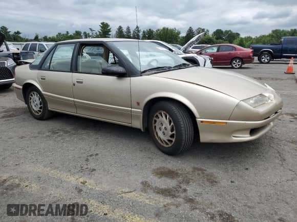 1994 Saturn SL с VIN 1G8ZK5578RZ228092, выставлен на аукционе Copart как лот 67421675 с пробегом 98 543 миль миль и Списание • Salvage title. История ставок и продаж доступна на DreamBid. Изображение 4.