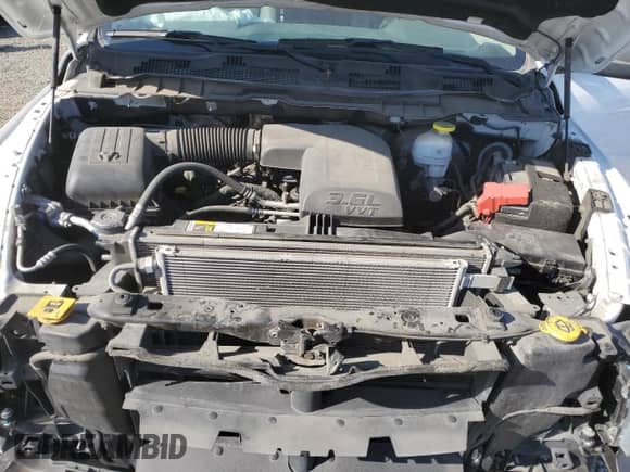 2020 Ram 1500 Tradesman z VIN 3C6JR6DGXLG169051, wystawiony jako Copart lot #50060715 z przebiegiem 108 962 mil mil oraz Szkoda całkowita • Salvage title. Historia ofert i sprzedaży dostępna na DreamBid. Obrazek 11.