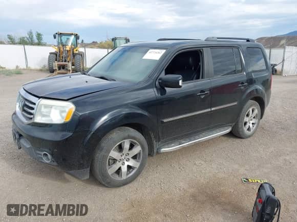 2014 Honda Pilot Touring with VIN 5FNYF3H97EB012774, listed as a IAAI auction lot 42724262 with 139,993 mi miles and . Bid and sale history available at DreamBid. Image 2.