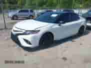 2024 Toyota Camry TRD with VIN 4T1KZ1AK1RU090619, listed as a IAAI auction lot 42931945 with 30,244 mi miles and . Bid and sale history available at DreamBid. Image 2.