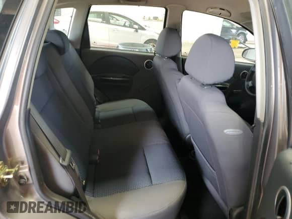 2007 Chevrolet Aveo SVM z VIN KL1TD66657B710422, wystawiony jako Copart lot #59855685 z przebiegiem 70 384 mil mil oraz Szkoda całkowita • Salvage title. Historia ofert i sprzedaży dostępna na DreamBid. Obrazek 10.