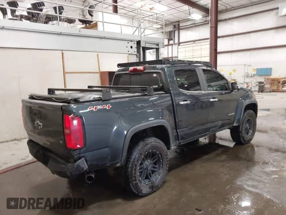 2018 Chevrolet Colorado 4WD LT z VIN 1GCGTCEN3J1150207, wystawiony jako IAAI lot #42887494 z przebiegiem 86 839 mil mil oraz . Historia ofert i sprzedaży dostępna na DreamBid. Obrazek 4.