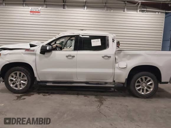 2021 Chevrolet Silverado 1500 LTZ with VIN 3GCUYGEL5MG270204, listed as a IAAI auction lot 42372926 with 66,832 mi miles and . Bid and sale history available at DreamBid. Image 14.
