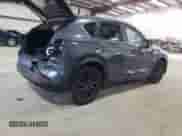 2025 Mazda CX-5 S Carbon Edition z VIN JM3KFBCM0S0599719, wystawiony jako Copart lot #64725555 z przebiegiem 3 501 mil mil oraz Szkoda całkowita • Salvage title. Historia ofert i sprzedaży dostępna na DreamBid. Obrazek 3.