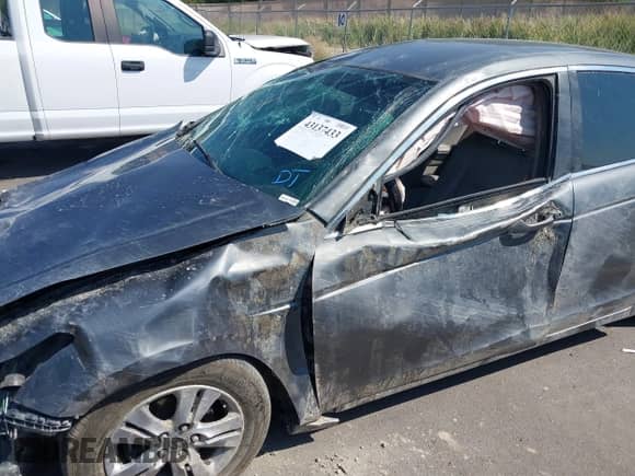 2012 Honda Accord LX Premium with VIN 1HGCP2F42CA058481, listed as a IAAI auction lot 43137433 with 215,370 mi miles and . Bid and sale history available at DreamBid. Image 6.