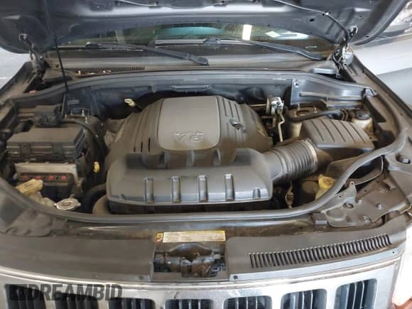 2012 Jeep Grand Cherokee Limited z VIN 1C4RJFBT9CC260334, wystawiony jako IAAI lot #42980030 z przebiegiem 186 641 mil mil oraz . Historia ofert i sprzedaży dostępna na DreamBid. Obrazek 10.