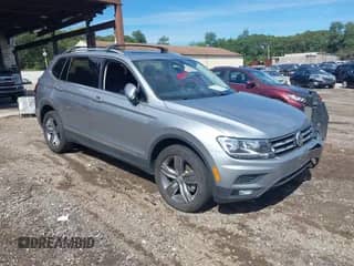 2020 Volkswagen Tiguan SE z VIN 3VV2B7AXXLM096634, wystawiony jako IAAI lot #43312076 z przebiegiem 61 294 mil mil oraz . Historia ofert i sprzedaży dostępna na DreamBid. Obrazek 1.