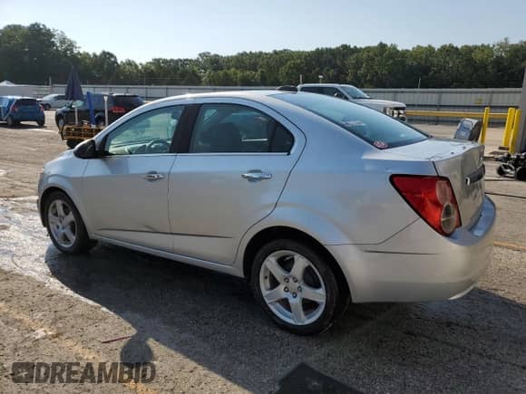 2016 Chevrolet Sonic LTZ with VIN 1G1JE5SB2G4137986, listed as a Copart auction lot 68088785 with 98,566 mi miles and Salvage title. Bid and sale history available at DreamBid. Image 2.
