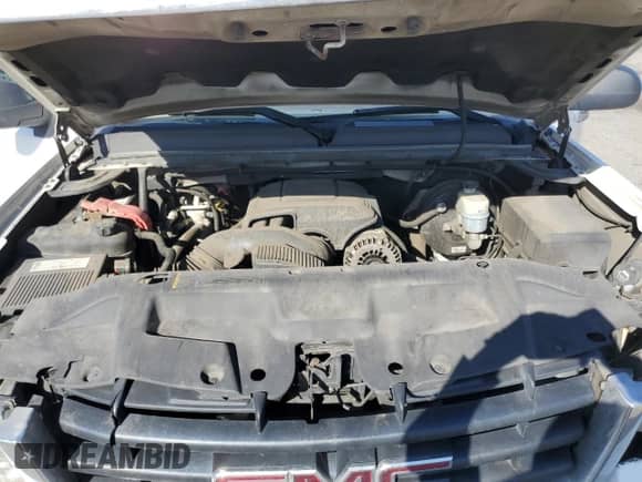 2007 GMC Sierra 1500 SLE1 with VIN 1GTEC19C87Z570530, listed as a Copart auction lot 60296765 with 215,143 mi miles and Salvage title. Bid and sale history available at DreamBid. Image 11.