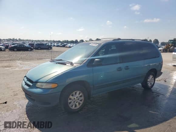 1999 Dodge Caravan SE with VIN 2B4GP44G9XR204463, listed as a Copart auction lot 64301385 with 291,785 mi miles and Salvage title. Bid and sale history available at DreamBid. Image 1.
