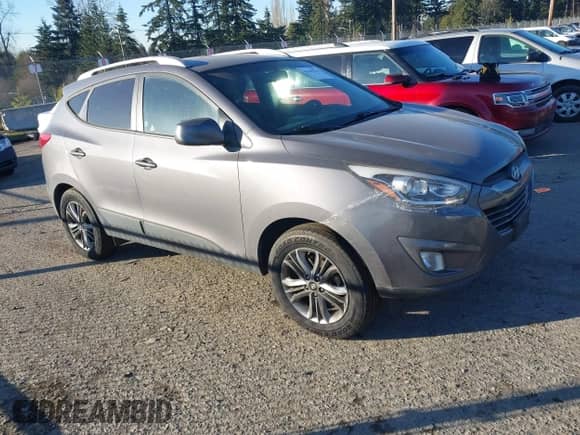 2014 Hyundai Tucson Walking Dead Edition z VIN KM8JUCAG1EU808097, wystawiony jako IAAI lot #41436214 z przebiegiem 114 198 mil mil oraz . Historia ofert i sprzedaży dostępna na DreamBid. Obrazek 1.