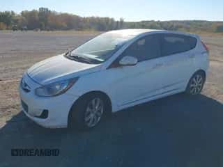 2013 Hyundai Accent SE with VIN KMHCU5AEXDU122478, listed as a IAAI auction lot 43616371 with 141,000 mi miles and . Bid and sale history available at DreamBid. Image 2.