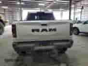 2021 Ram 1500 z VIN IA046229, wystawiony jako Copart lot #59465905 z przebiegiem 19 796 mil mil oraz Szkoda całkowita • Salvage title. Historia ofert i sprzedaży dostępna na DreamBid. Obrazek 6.