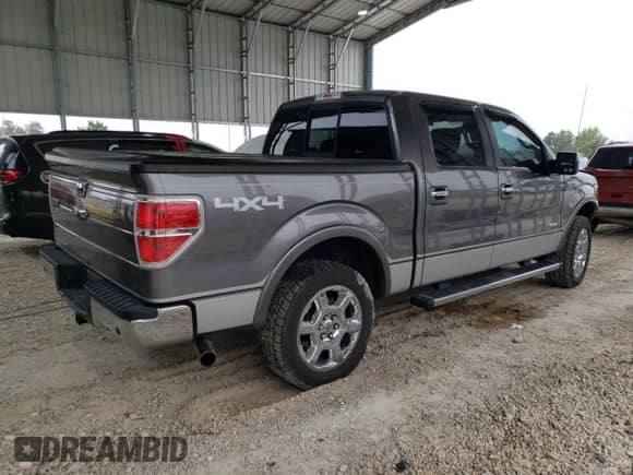 2013 Ford F-150 Lariat with VIN 1FTFW1ET2DFC87796, listed as a Copart auction lot 71112565 with 207,394 mi miles and Salvage title. Bid and sale history available at DreamBid. Image 3.