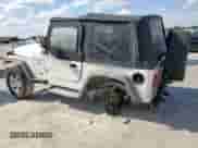 2001 Jeep Wrangler Sport с VIN 1J4FA49S01P305620, выставлен на аукционе Copart как лот 85516025 с пробегом Не указан миль и Списание • Salvage title. История ставок и продаж доступна на DreamBid. Изображение 2.