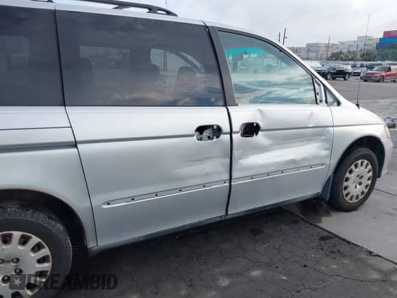2004 Honda Odyssey LX with VIN 5FNRL18524B042391, listed as a IAAI auction lot 43280655 with 165,252 mi miles and . Bid and sale history available at DreamBid. Image 6.