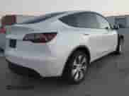 2023 Tesla Model Y Long Range with VIN 7SAYGDEE8PA147396, listed as a IAAI auction lot 43437271 with 24,608 mi miles and . Bid and sale history available at DreamBid. Image 4.