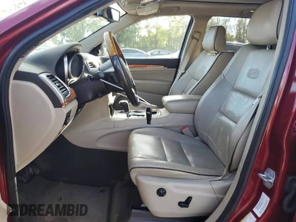 2012 Jeep Grand Cherokee Overland z VIN 1C4RJFCG6CC264603, wystawiony jako Copart lot #85195365 z przebiegiem 158 012 mil mil oraz Szkoda całkowita • Salvage title. Historia ofert i sprzedaży dostępna na DreamBid. Obrazek 7.