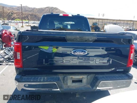 2023 Ford F-150 XLT с VIN 1FTFW1E89PKE05060, выставлен на аукционе IAAI как лот 43299204 с пробегом 79 389 миль миль и . История ставок и продаж доступна на DreamBid. Изображение 17.