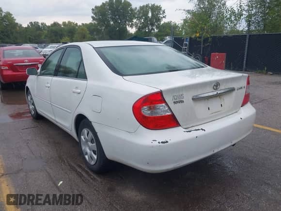 2004 Toyota Camry LE with VIN 4T1BE32KX4U353074, listed as a IAAI auction lot 43238071 with 320,472 mi miles and . Bid and sale history available at DreamBid. Image 3.