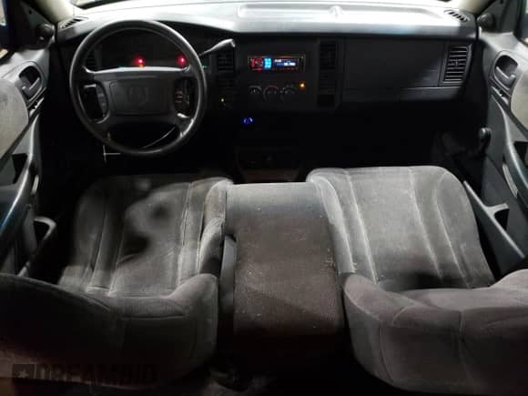 2003 Dodge Dakota Sport z VIN 1D7HG38X23S299507, wystawiony jako Copart lot #67698734 z przebiegiem 146 696 mil mil oraz Szkoda całkowita • Salvage title. Historia ofert i sprzedaży dostępna na DreamBid. Obrazek 8.