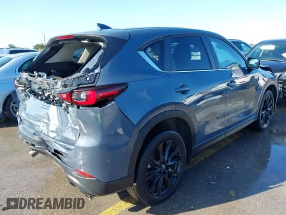 2023 Mazda CX-5 S Preferred z VIN JM3KFBCM3P0164913, wystawiony jako IAAI lot #43090454 z przebiegiem 48 866 mil mil oraz . Historia ofert i sprzedaży dostępna na DreamBid. Obrazek 4.