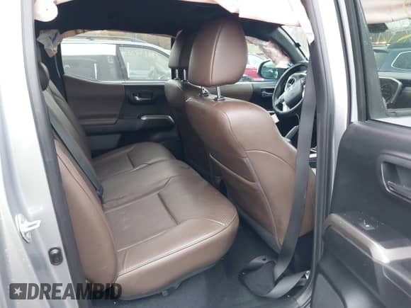 2021 Toyota Tacoma Limited with VIN 3TMGZ5ANXMM421920, listed as a IAAI auction lot 40852472 with 28,591 mi miles and . Bid and sale history available at DreamBid. Image 8.