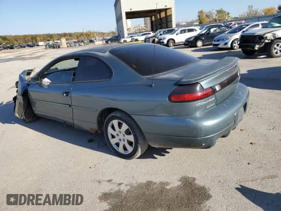 1999 Dodge Avenger with VIN 4B3AU42NXXE127845, listed as a Copart auction lot 77039954 with 113,630 mi miles and Salvage title. Bid and sale history available at DreamBid. Image 2.