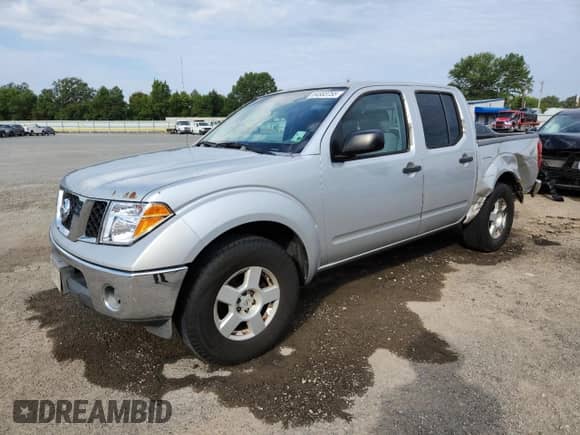 2007 Nissan Frontier SE with VIN 1N6AD07U07C409008, listed as a Copart auction lot 84583755 with 246,686 mi miles and Salvage title. Bid and sale history available at DreamBid. Image 1.