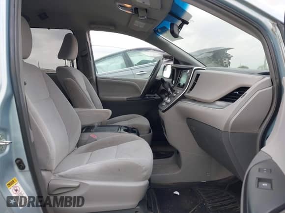 2015 Toyota Sienna LE AAS z VIN 5TDKK3DC7FS604255, wystawiony jako IAAI lot #43510130 z przebiegiem 127 963 mil mil oraz . Historia ofert i sprzedaży dostępna na DreamBid. Obrazek 5.