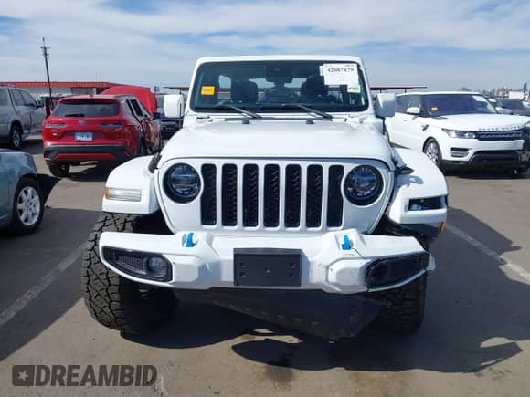 2021 Jeep Wrangler Unlimited Sahara z VIN 1C4JJXP63MW716690, wystawiony jako IAAI lot #42087879 z przebiegiem 40 889 mil mil oraz . Historia ofert i sprzedaży dostępna na DreamBid. Obrazek 12.