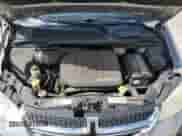 2014 Dodge Grand Caravan American Value with VIN 2C4RDGBG5ER101854, listed as a Copart auction lot 67929095 with 165,607 mi miles and Salvage title. Bid and sale history available at DreamBid. Image 12.