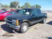 1997 Chevrolet Silverado 1500 with VIN 2GCEK19R5V1180353, listed as a IAAI auction lot 43385908 with 231,909 mi miles and . Bid and sale history available at DreamBid. Image 2.