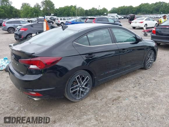 2020 Hyundai Elantra Sport with VIN KMHD04LBXLU061791, listed as a IAAI auction lot 42864666 with 87,332 mi miles and . Bid and sale history available at DreamBid. Image 4.