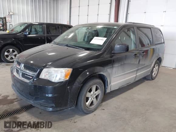 2013 Dodge Grand Caravan SXT z VIN 2C4RDGCGXDR536866, wystawiony jako IAAI lot #43354986 z przebiegiem 205 400 mil mil oraz . Historia ofert i sprzedaży dostępna na DreamBid. Obrazek 2.