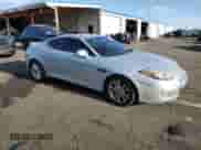 2007 Hyundai Tiburon GS with VIN KMHHM66DX7U246220, listed as a Copart auction lot 53555715 with 105,305 mi miles and Salvage title. Bid and sale history available at DreamBid. Image 4.