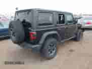 2023 Jeep Wrangler Rubicon with VIN 1C4JJXR68PW663339, listed as a IAAI auction lot 42433347 with 40,360 mi miles and . Bid and sale history available at DreamBid. Image 4.