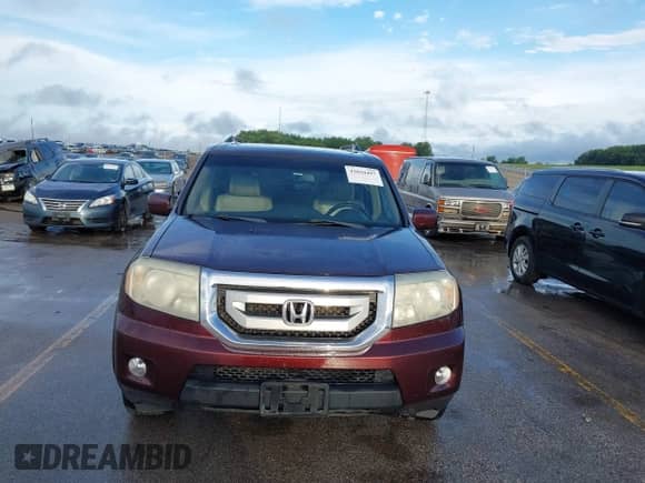 2009 Honda Pilot Touring with VIN 5FNYF38819B022195, listed as a IAAI auction lot 42850497 with 192,072 mi miles and . Bid and sale history available at DreamBid. Image 6.