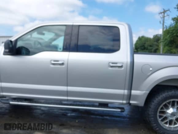 2016 Ford F-150 XLT with VIN 1FTEW1EF0GFD30896, listed as a IAAI auction lot 43002323 with 133,068 mi miles and . Bid and sale history available at DreamBid. Image 14.