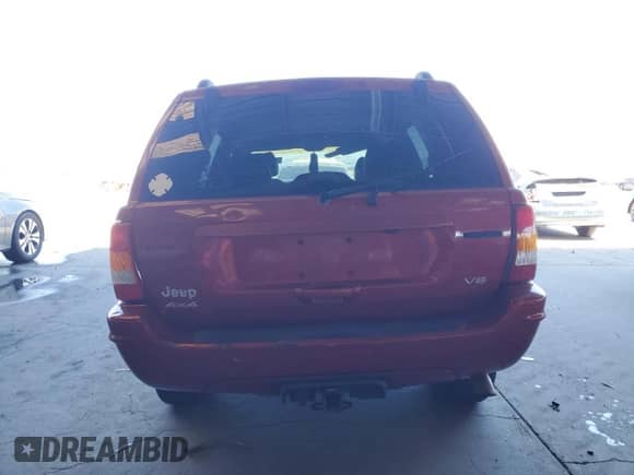 2002 Jeep Grand Cherokee Limited with VIN 1J4GW58N12C202691, listed as a Copart auction lot 64265975 with 118,480 mi miles and Salvage title. Bid and sale history available at DreamBid. Image 6.