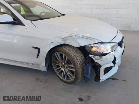 2015 BMW 4 Series 428i xDrive z VIN WBA4A7C55FD413965, wystawiony jako IAAI lot #42368615 z przebiegiem 108 308 mil mil oraz . Historia ofert i sprzedaży dostępna na DreamBid. Obrazek 6.