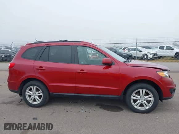 2011 Hyundai Santa Fe SE with VIN 5XYZHDAG1BG076925, listed as a IAAI auction lot 43204667 with 320,107 mi miles and . Bid and sale history available at DreamBid. Image 13.
