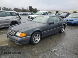 1992 Mercedes-Benz SL с VIN WDBFA61E9NF047034, выставлен на аукционе Copart как лот 43946675 с пробегом 110 457 миль миль и Списание • Salvage title. История ставок и продаж доступна на DreamBid. Изображение 1.
